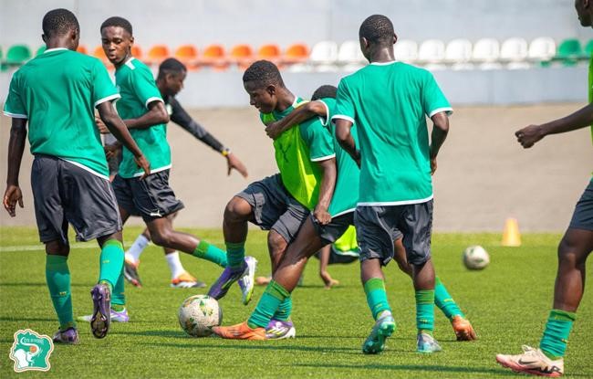 Young football players training